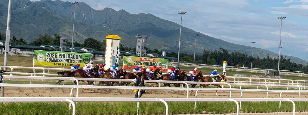 Philippine horse racing at the PJC Japan Cup, with racehorses competing on the track